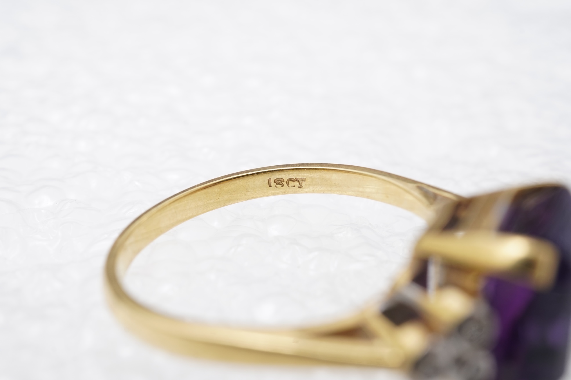 An amethyst and diamond ring